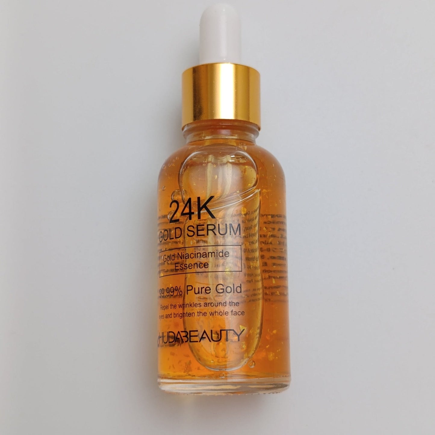 Huda Beauty 24K Gold Face Serum – Pure Gold Anti-Aging & Brightening Serum (30ml)