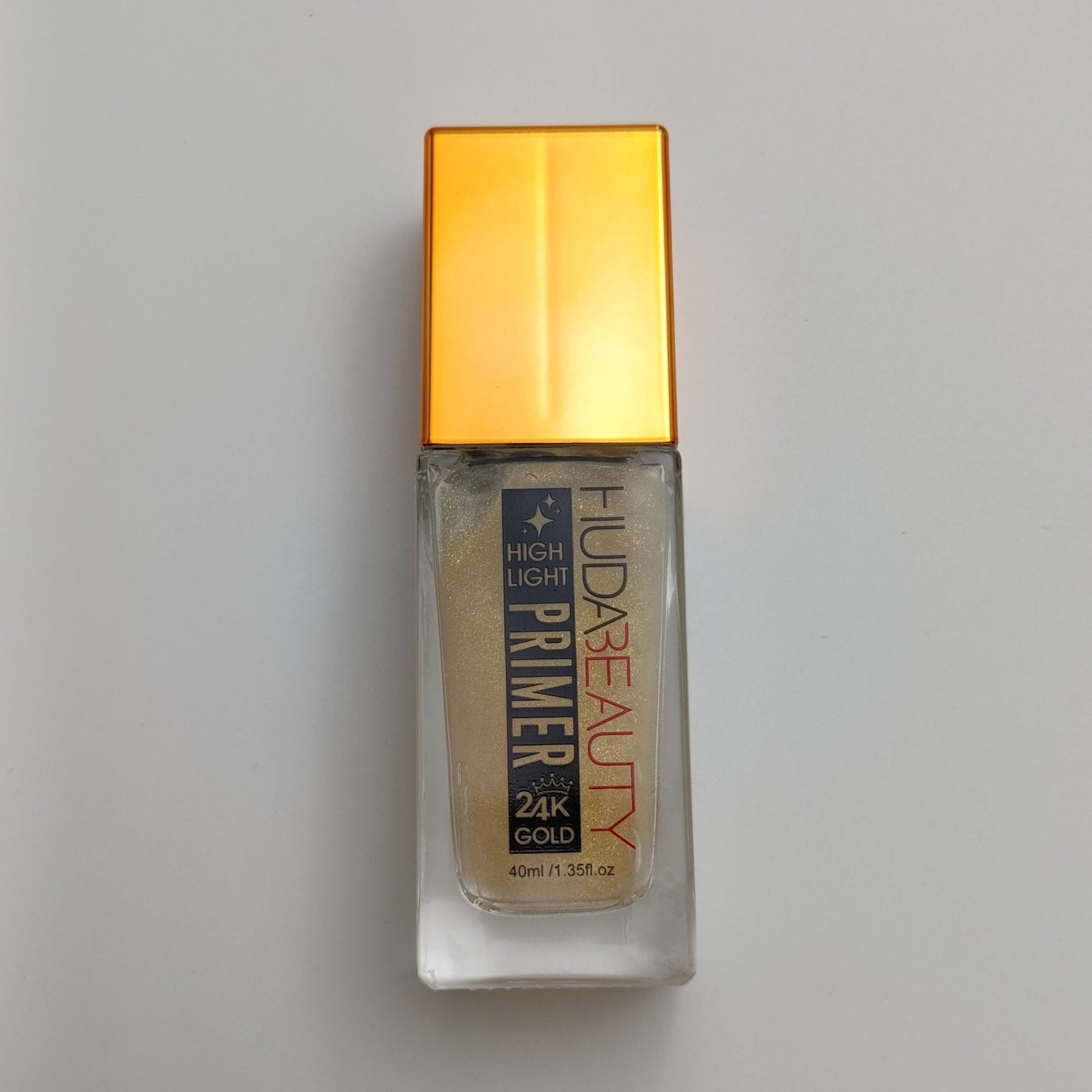 Huda Beauty 24K Gold Highlight Primer – Radiant Glow & Long-Lasting Makeup (40ml)